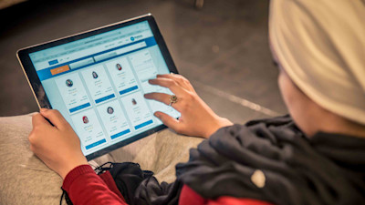 Woman surfing the website on a tab device