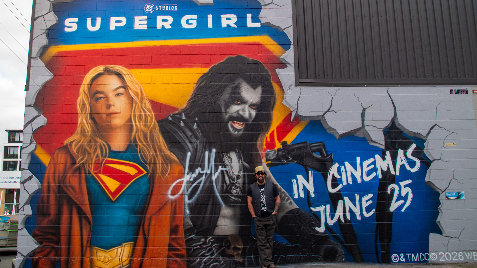 Jason Momoa signs giant 'Supergirl' mural in Auckland