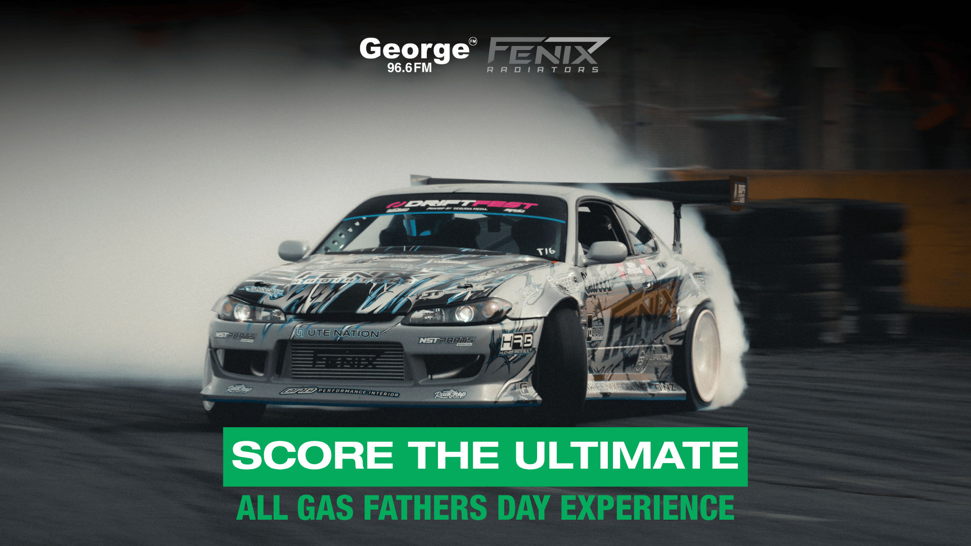 A highly modified silver drift car smokes its tires while cornering on a race track, with George FM, Fenix Radiators, and Fathers Day event logos visible.