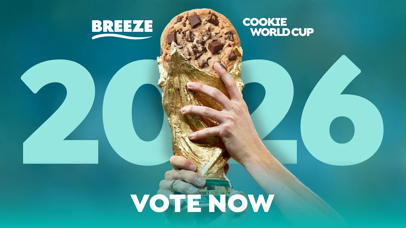 A large chocolate chip cookie is perched on a gold trophy held by hands, against a teal background with huge light blue numbers '2026' and white text 'BREEZE COOKIE WORLD CUP VOTE NOW'.