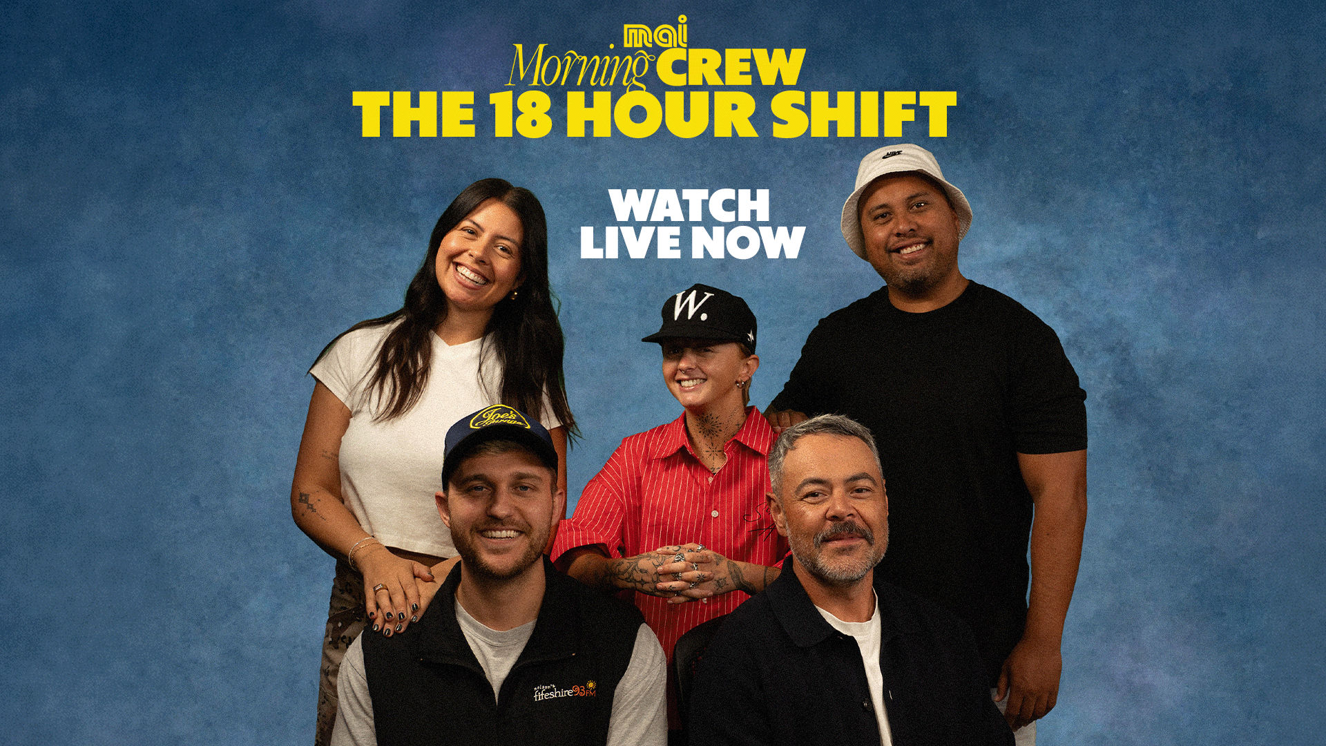 Five smiling radio hosts, three men and two women, pose under text that reads "mai Morning Crew THE 18 HOUR SHIFT WATCH LIVE NOW" on a blue background.