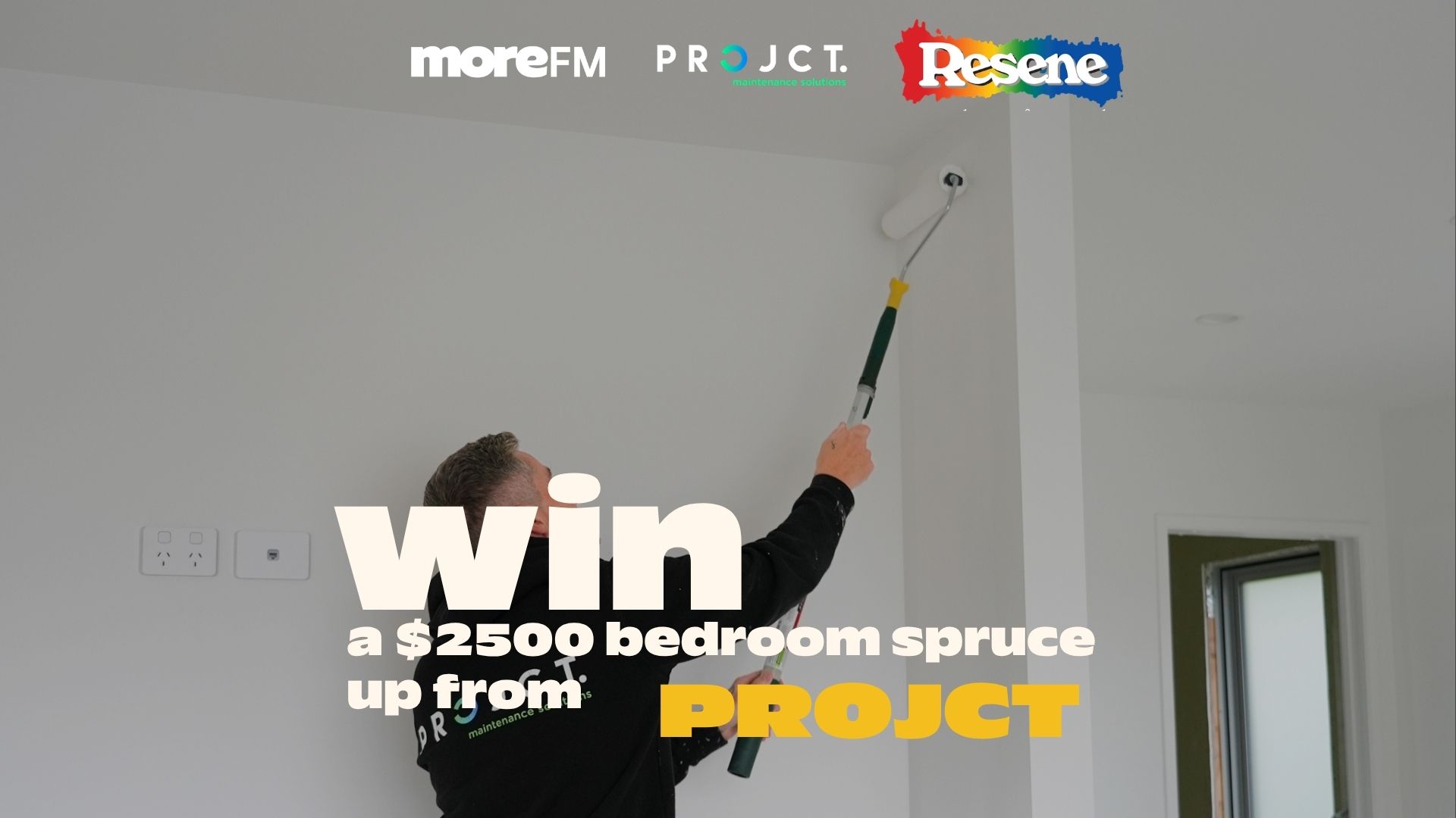 A man paints a white ceiling with a roller, with moreFM, PROJECT maintenance solutions, and Resene logos at the top, and text overlaid "Win a $2500 bedroom spruce up from PROJECT".