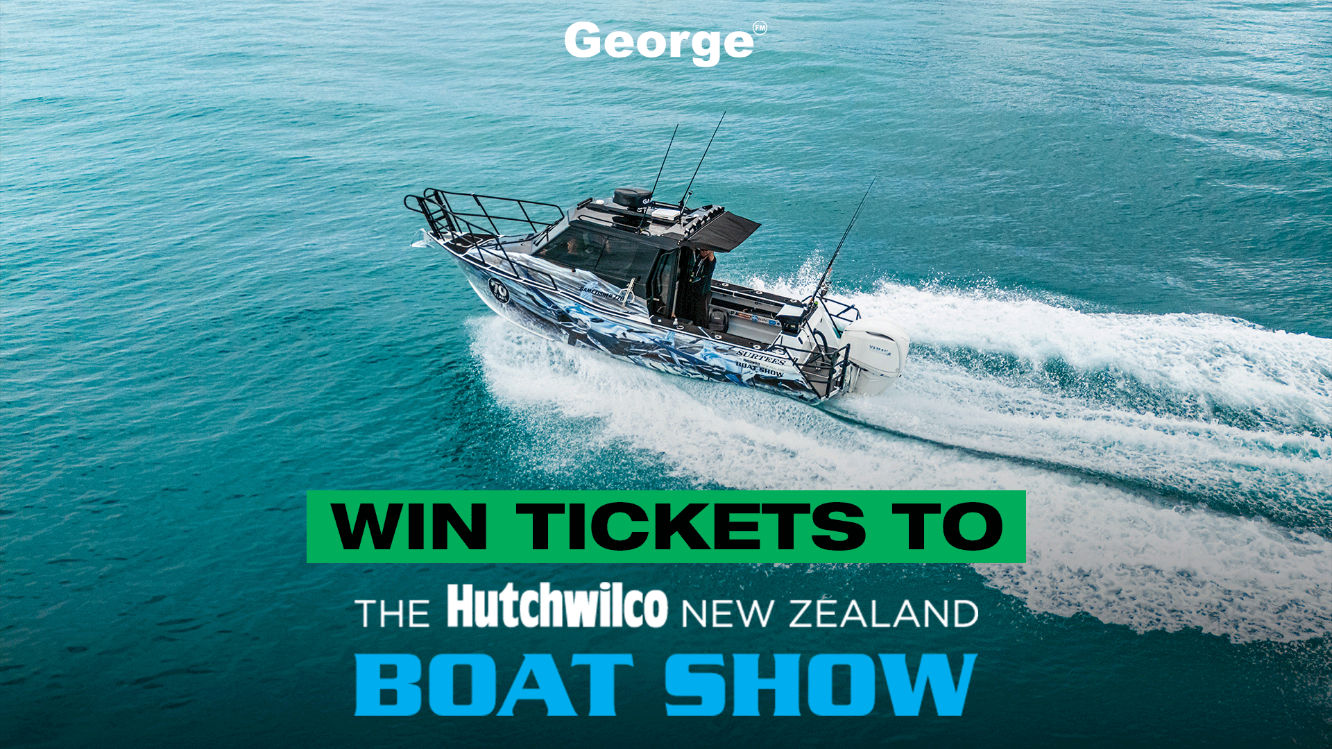 A powerboat with a blue and white camouflage design speeds across teal water, creating a white wake, with text overlay for "George" and "WIN TICKETS TO THE Hutchwilco NEW ZEALAND BOAT SHOW".