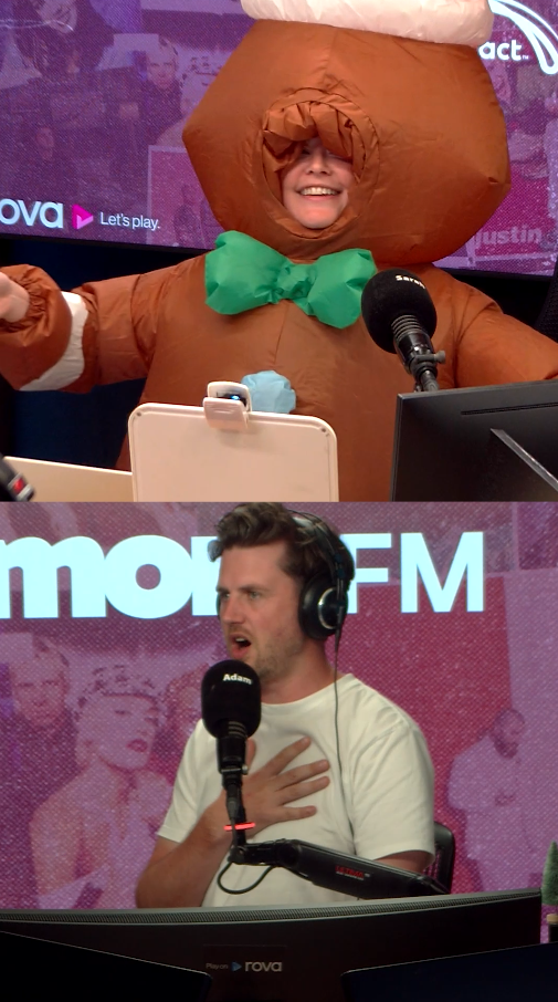 Sarah in an inflatable gingerbread man suit with adam looking shocked