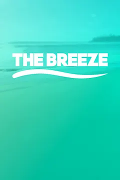 The Breeze logo with beach behind