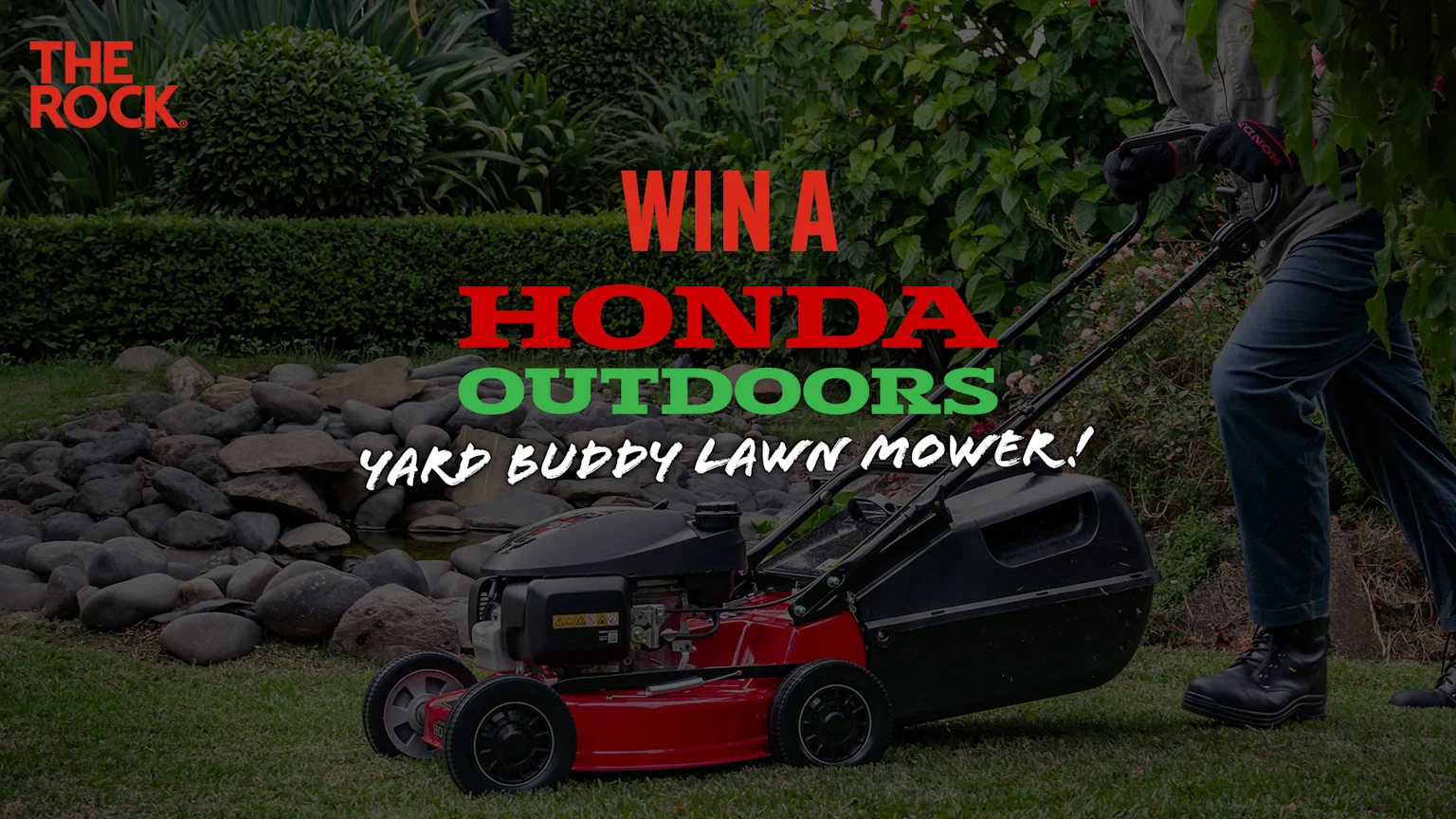 A person pushes a red and black Honda Yard Buddy lawn mower across green grass, with text "Win a Honda Outdoors Yard Buddy Lawn Mower!" overhead and "THE ROCK" logo.