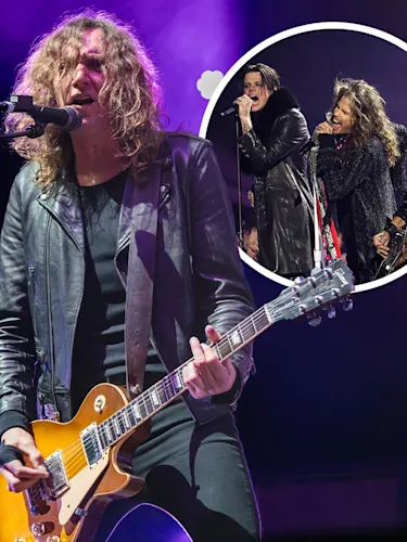The Darkness' Dan Hawkins on stage, Yungblud and Aerosmith in a small circle behind him