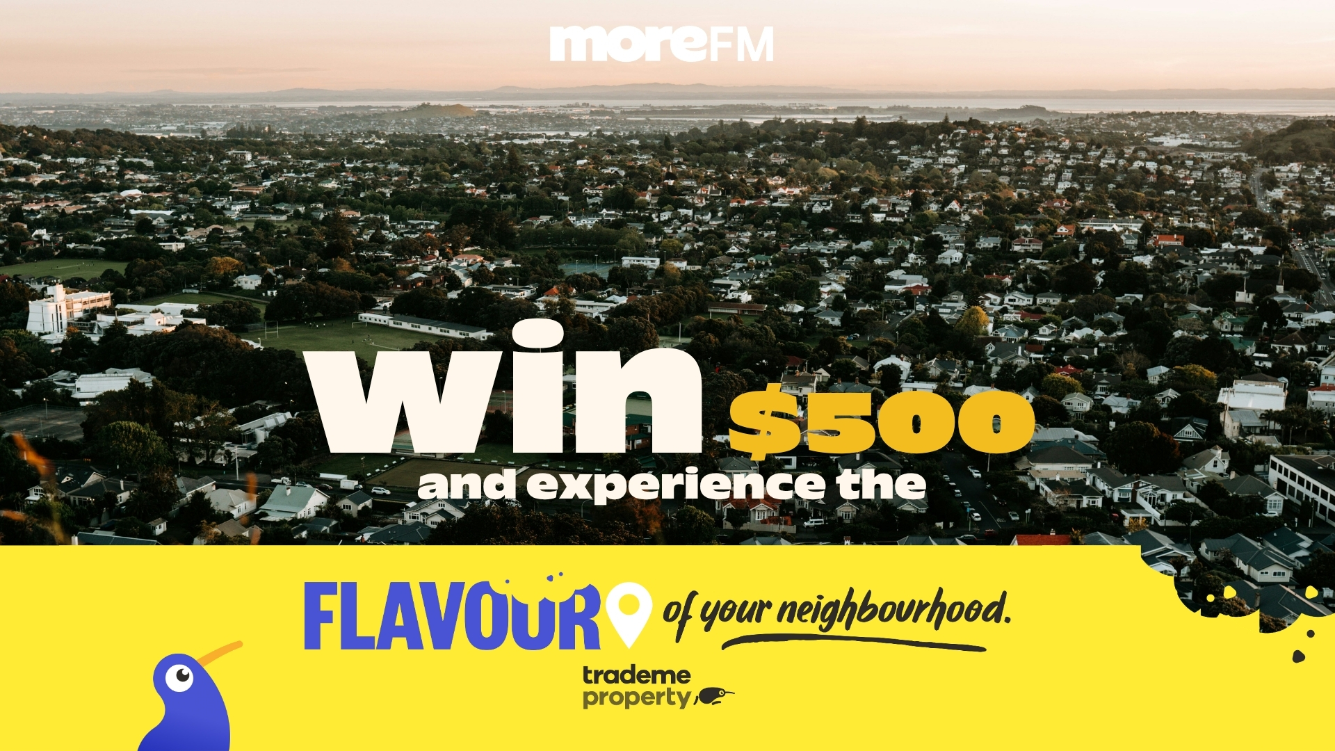 Aerial view of a suburban neighborhood with "Win $500 and experience the FLAVOUR of your neighbourhood." text overlays, promoting a contest from moreFM and trademe property.