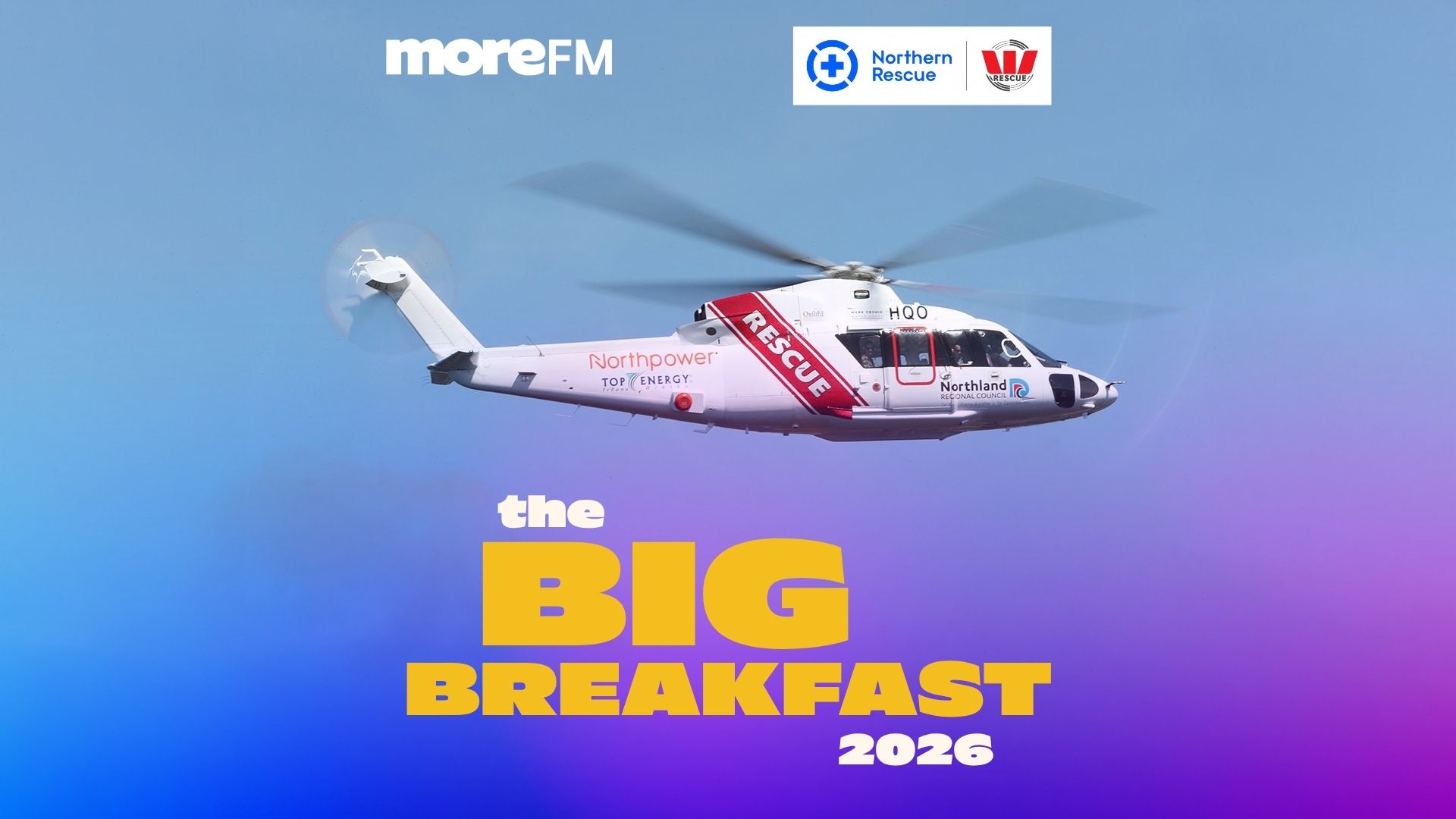 A rescue helicopter with Northpower and Northland Regional Council logos flies under MoreFM and Northern Rescue logos, above "the BIG BREAKFAST 2026" text on a gradient sky.