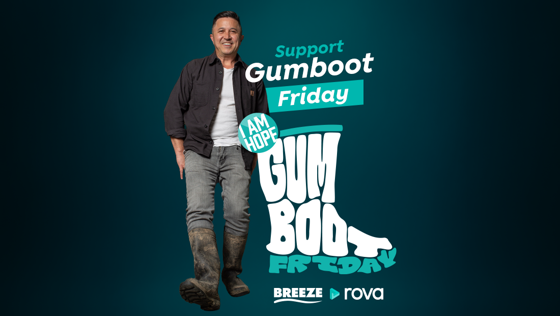 A smiling man in gumboots stands next to large white text "GUMBOOT FRIDAY" and smaller text "Support Gumboot Friday", with an "I AM HOPE" logo and Breeze and rova logos.
