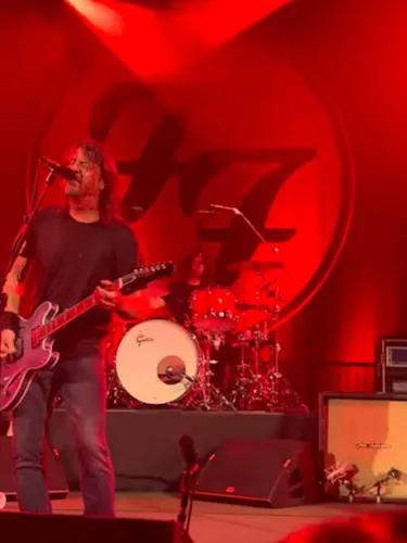 Foo Fighters onstage with their new drummer, Ilan Rubin.