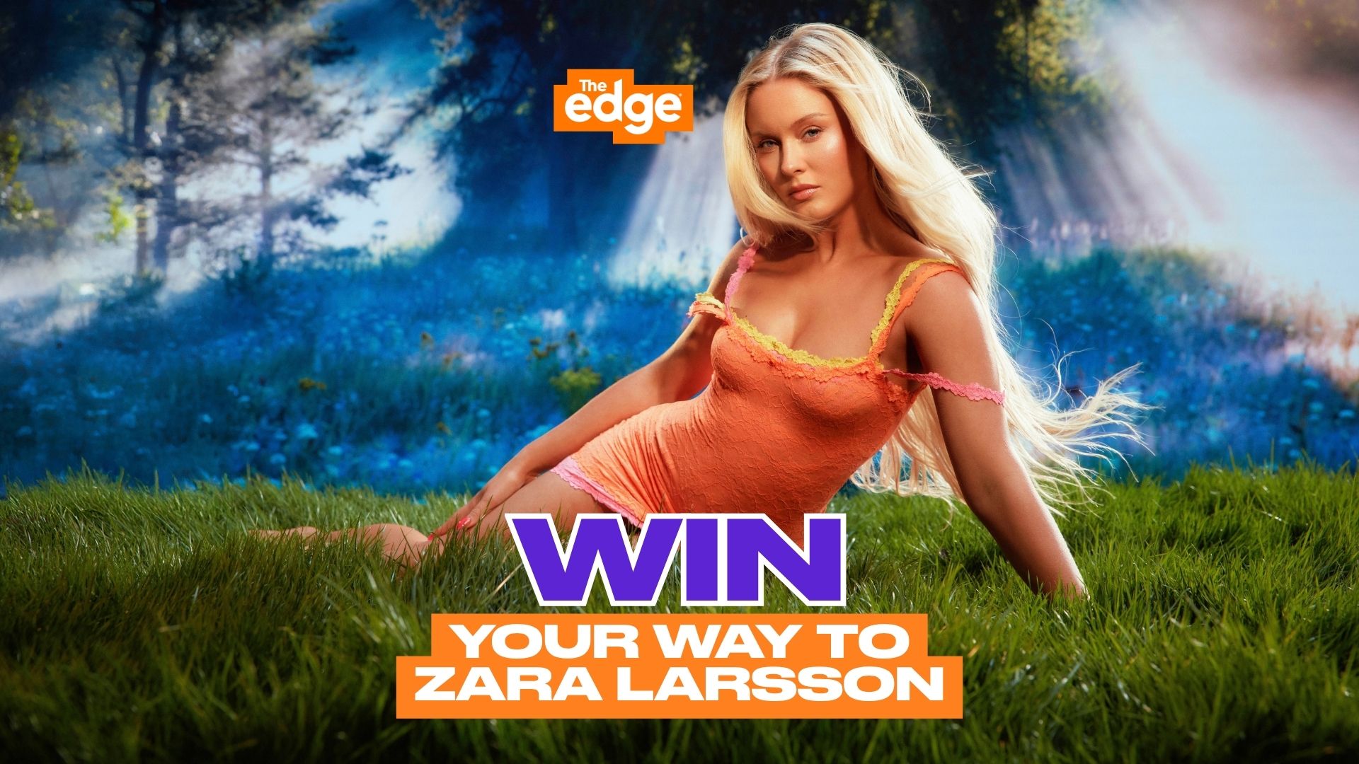 Zara Larsson in an orange mini-dress with blonde hair lies on grass, backed by a blue forest with light rays. Text: The Edge, WIN YOUR WAY TO ZARA LARSSON.