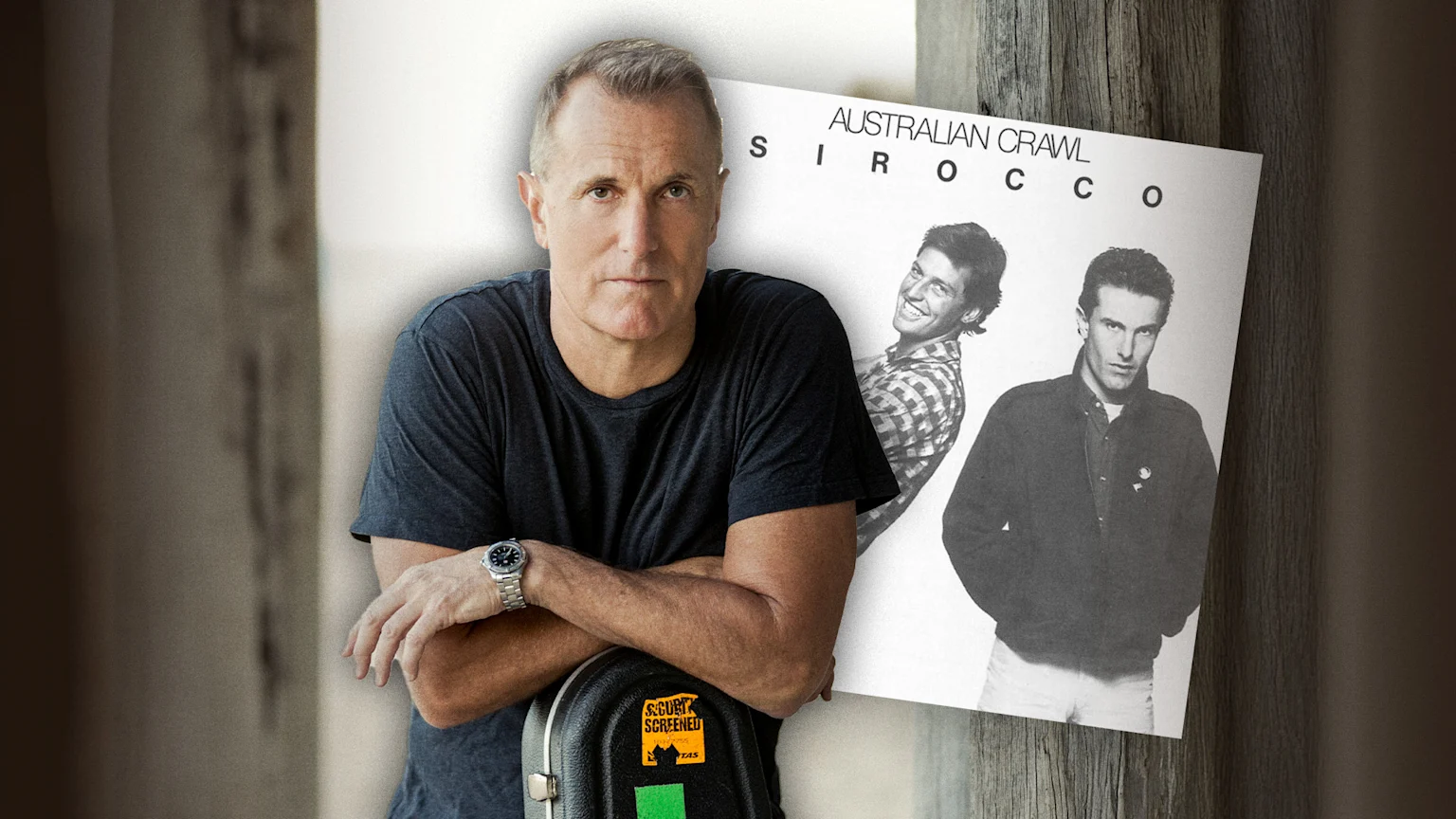 James Reyne posing with guitar overlayed on image of Australian Crawl album cover art