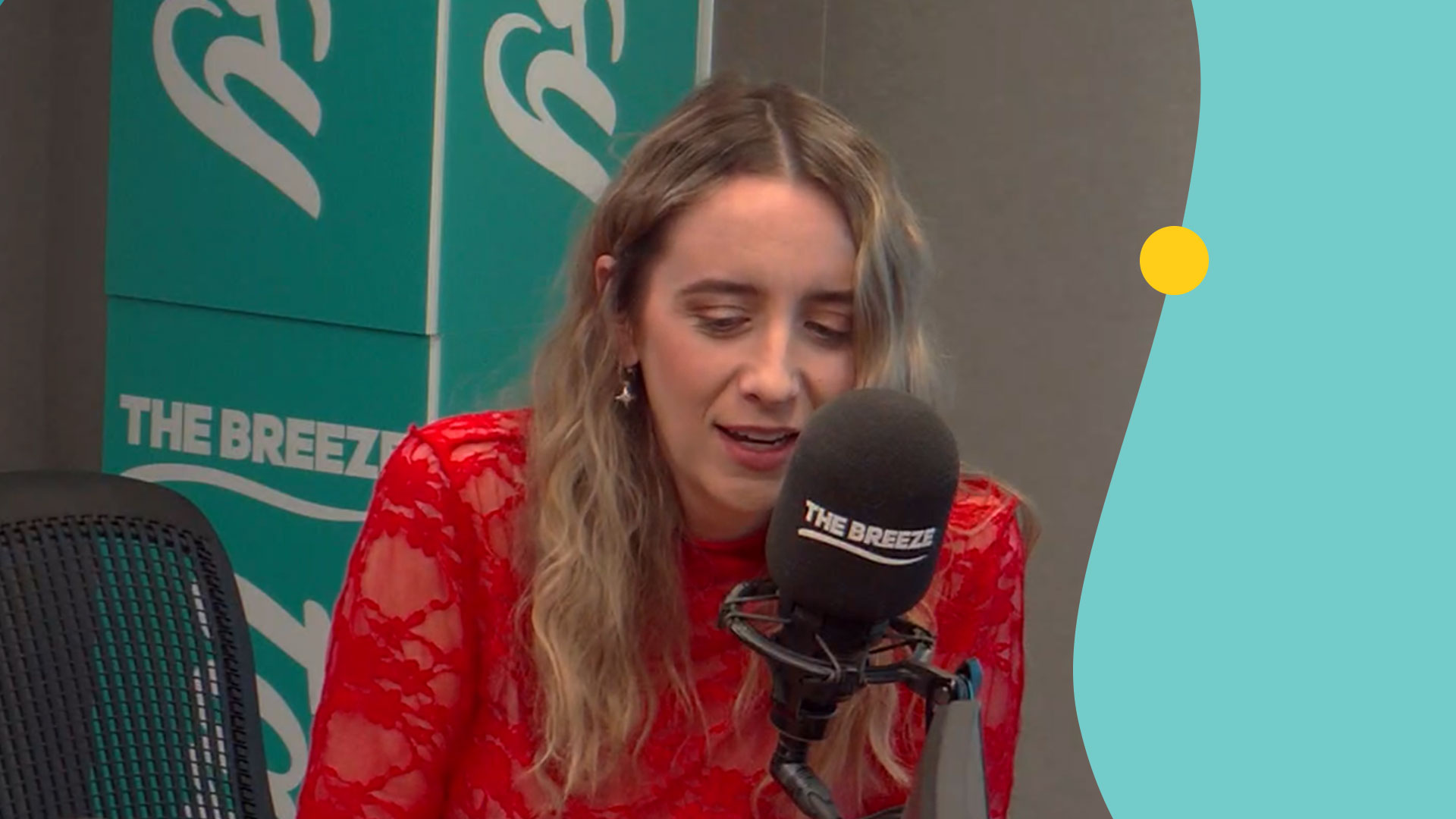 Country star Kaylee Bell talking in the breeze studio