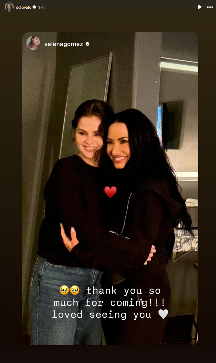 Selena Gomez (left) and Demi Lovato (right) smile broadly while embracing, with a red heart emoji between them and text that reads: "thank you so much for coming!!! loved seeing you."