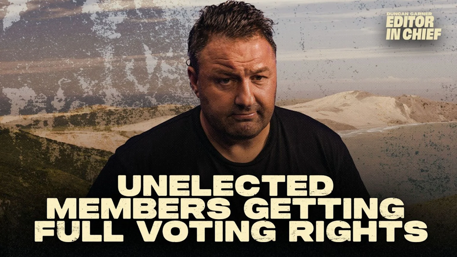 A man in a black t-shirt looks at the viewer, with bold text "UNELECTED MEMBERS GETTING FULL VOTING RIGHTS" prominent at the bottom, and "DUNCAN GARNER EDITOR IN CHIEF" at the top right, all set against a textured, earthy landscape.