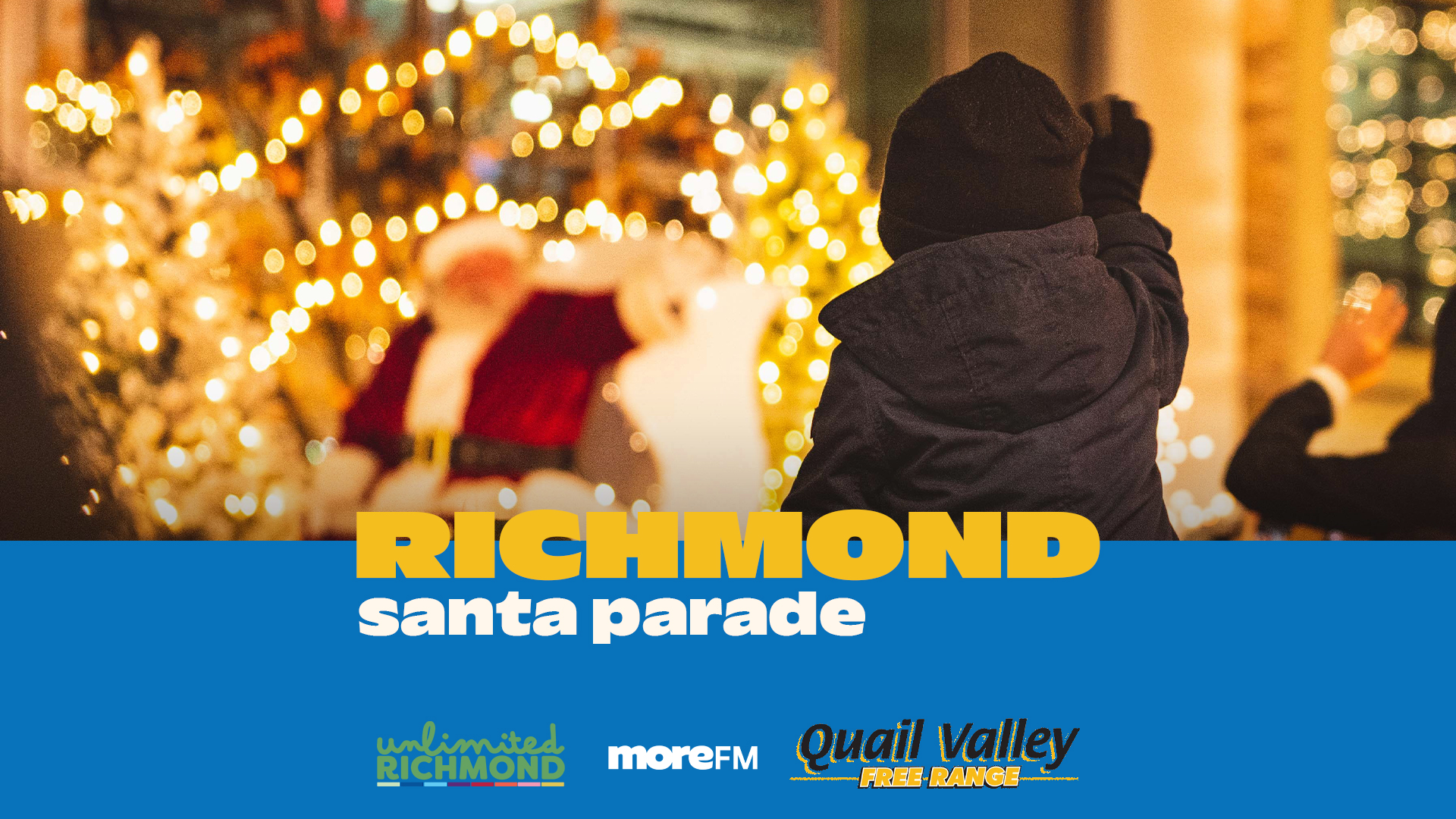 Kid waving to Santa at a Christmas Santa Parade