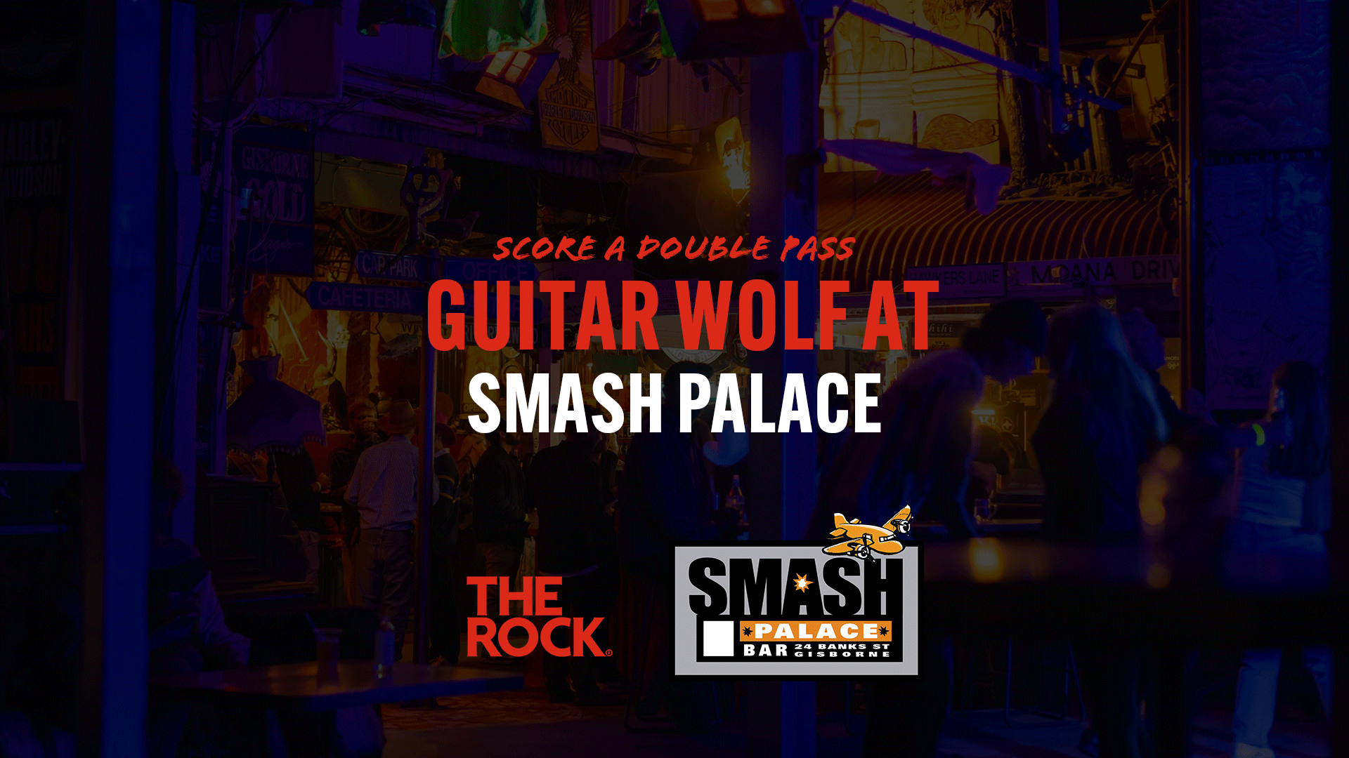 Text "SCORE A DOUBLE PASS GUITAR WOLF AT SMASH PALACE" over a dark image of people in a bar, with "THE ROCK" and "SMASH PALACE BAR GISBORNE" logos.