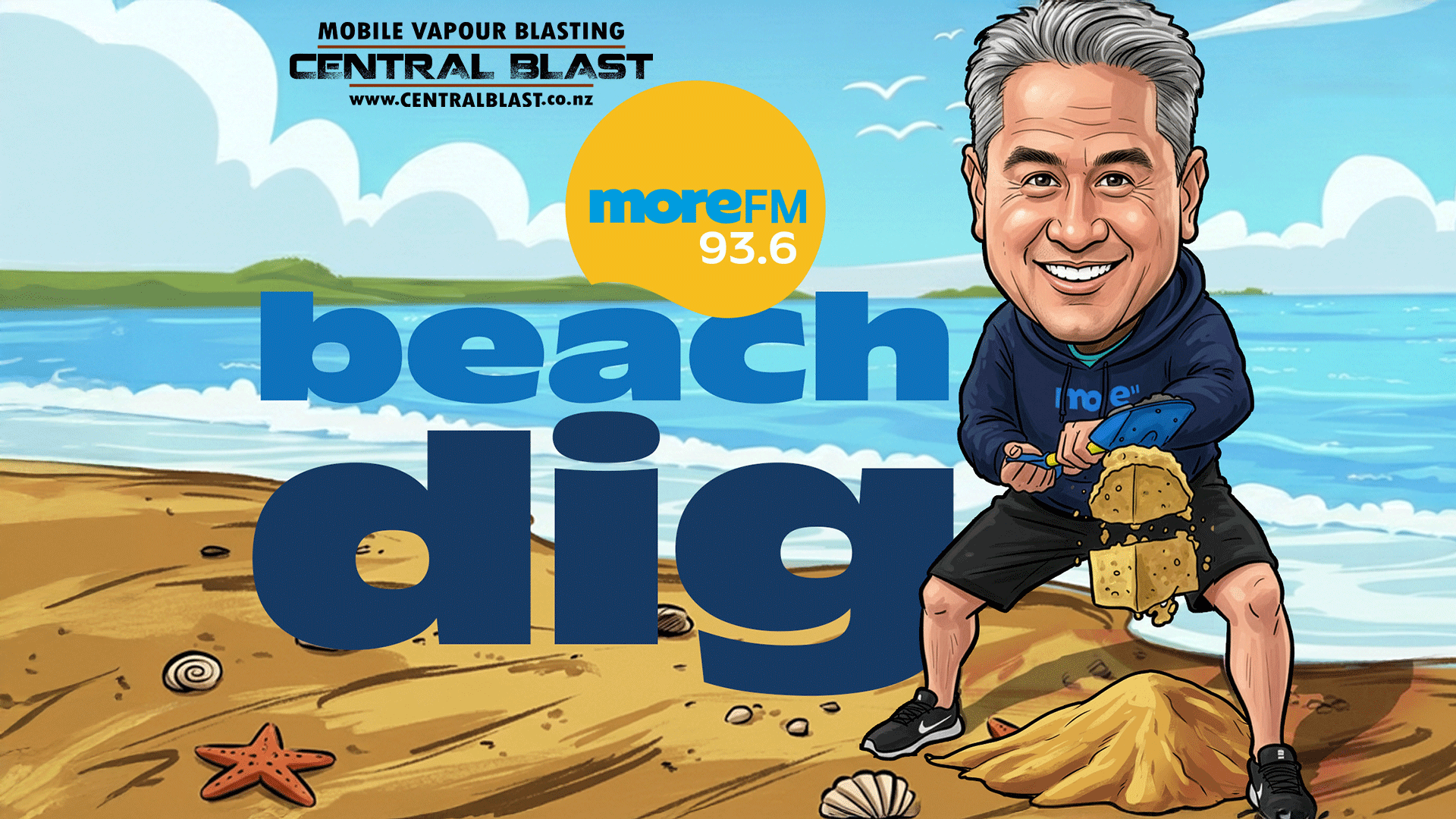A smiling man in a more fm hoodie kneels on a dark sand beach with a small shovel, against a lake background, with "more fm Beach Dig with Central Blast Taupo" text overlay.
