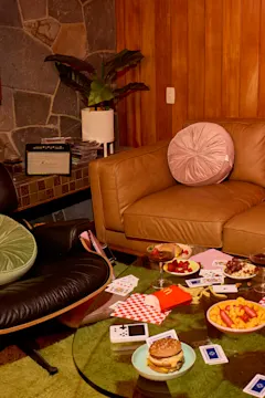 Cozy lounge with fast food and card game