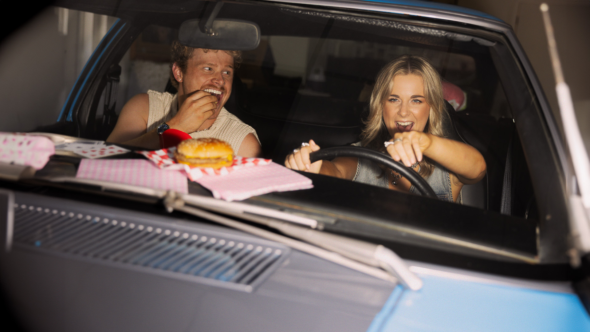 `Caland Yas in car laughing, eating and having fun