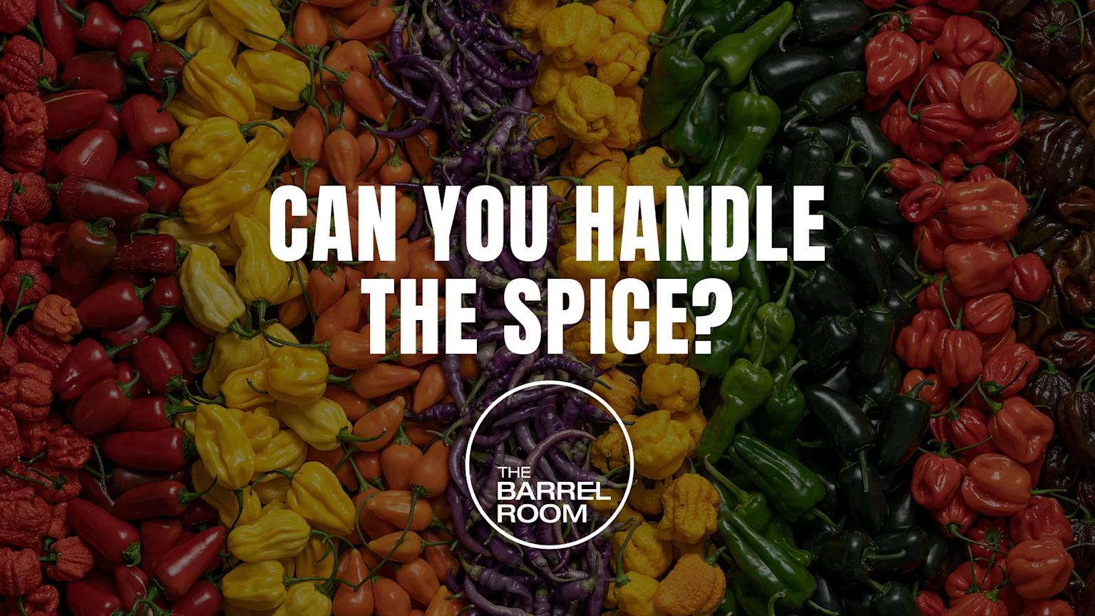 A colorful array of chili peppers in shades of red, yellow, orange, purple, and green, with text "CAN YOU HANDLE THE SPICE?" and "THE BARREL ROOM" overlaid.