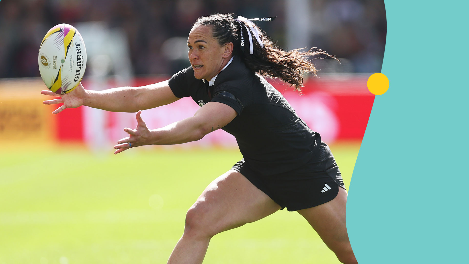 Portia Woodman-Wickcliffe catching rugby ball