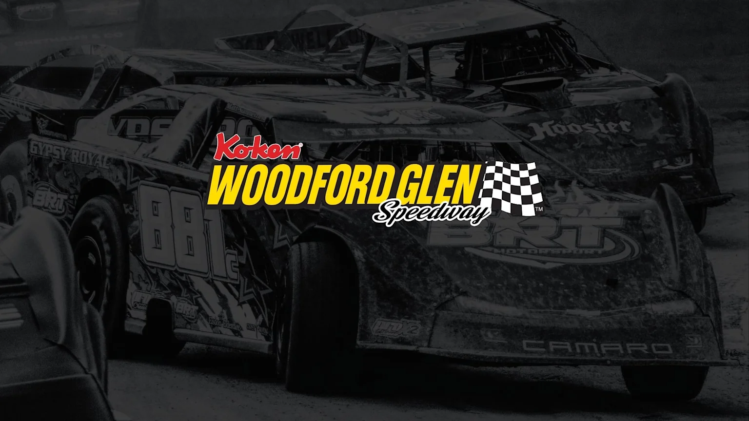 A desaturated image of several dirt track race cars, with a prominent "Koken Woodford Glen Speedway" logo in red and yellow with a checkered flag.