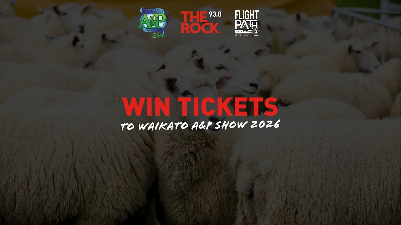 A close-up of many white sheep with the overlaid text "WIN TICKETS TO WAIKATO A&P SHOW 2026" in red and white, accompanied by event sponsor logos at the top.