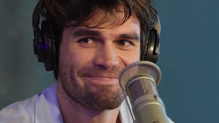 KJ Apa giving cheeky look in interview with Andy Cohen