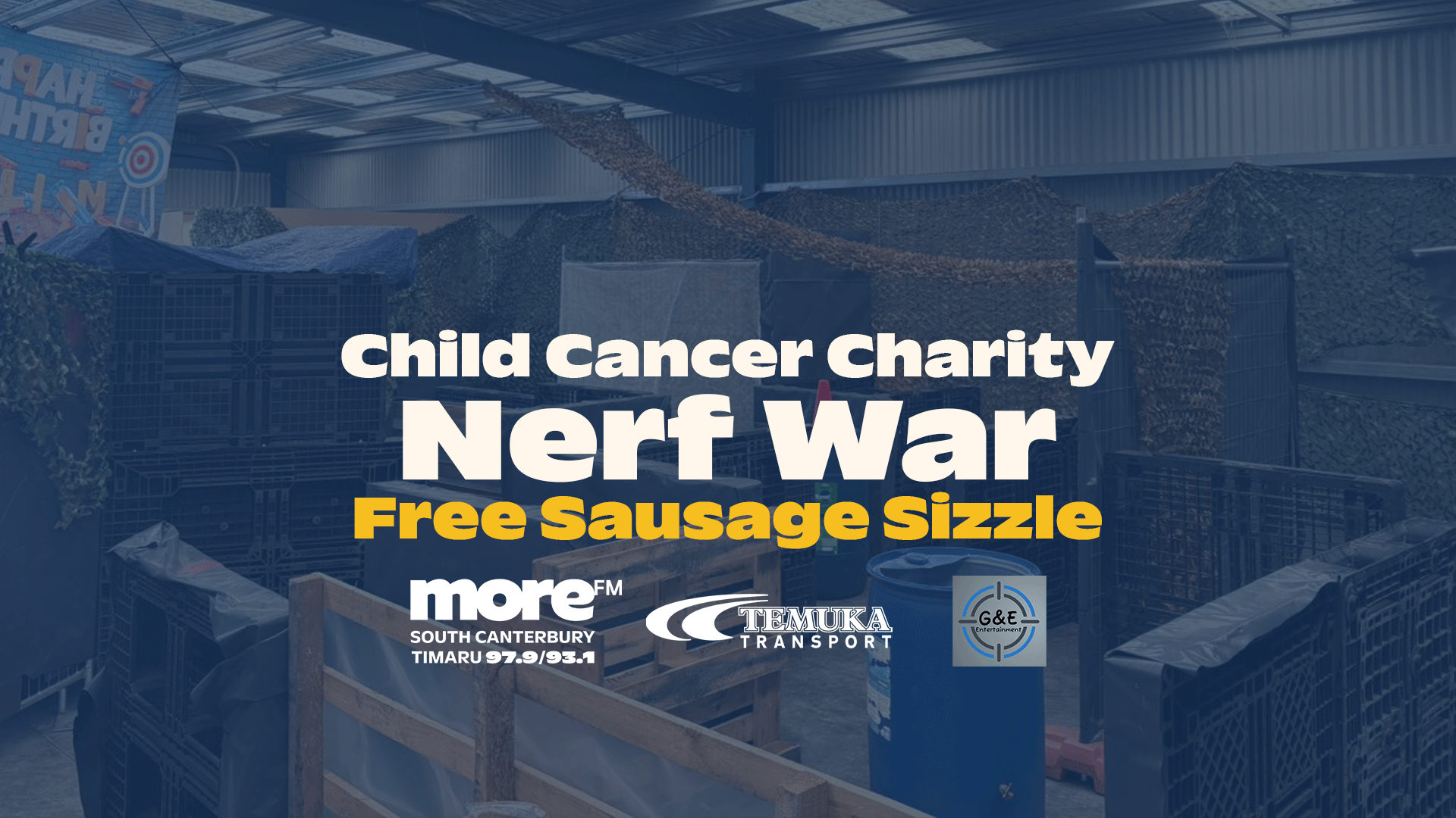 An indoor Nerf war arena with obstacles made from crates and netting, featuring "Child Cancer Charity Nerf War" text and logos including South Canterbury's More FM.