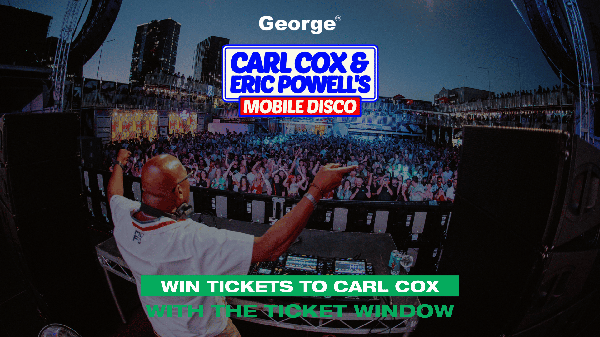 DJ Carl Cox performs for a large crowd at an outdoor "Mobile Disco" event, with event branding and a "Win Tickets" message visible.