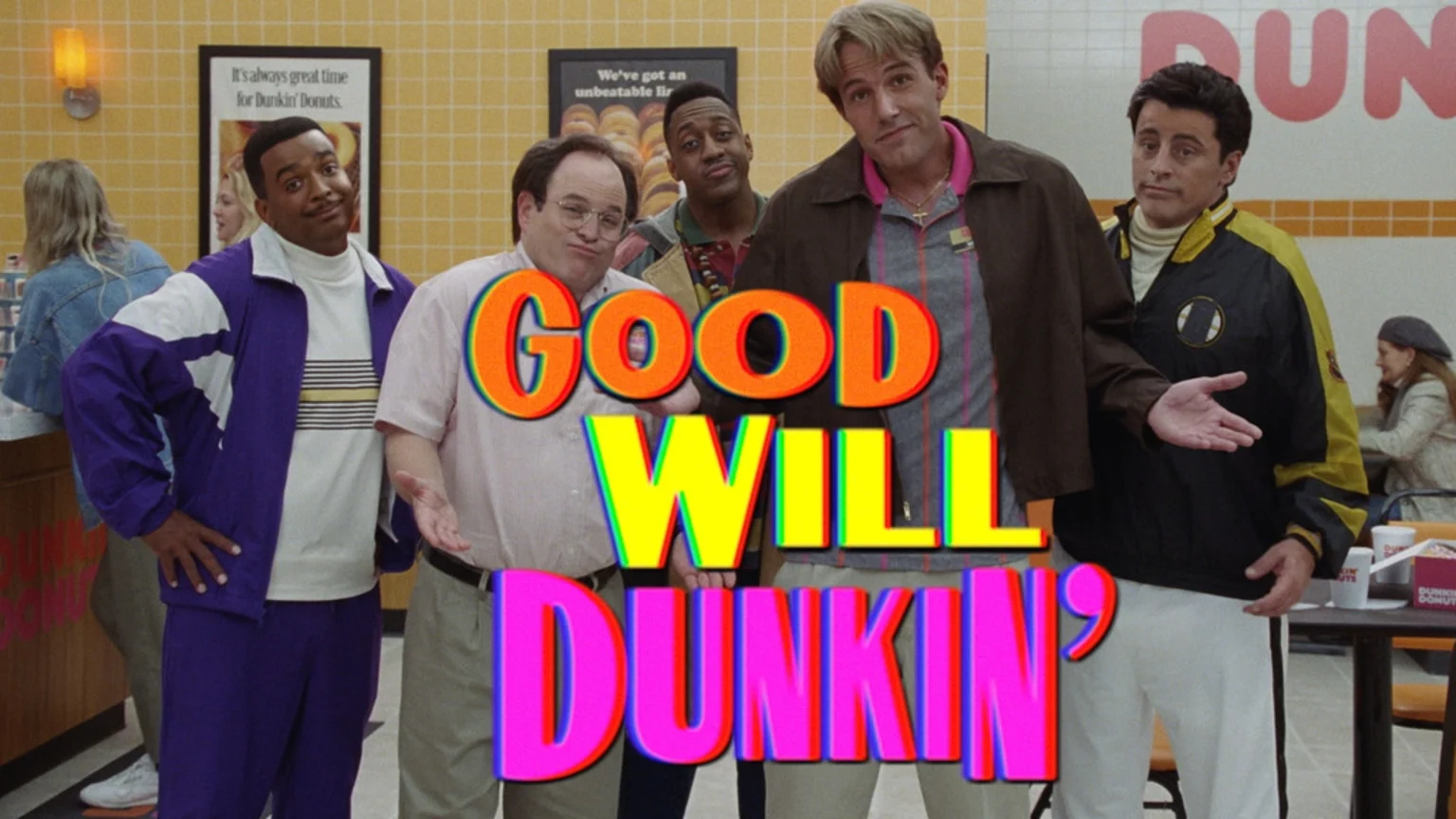 Five men stand in front of a Dunkin' Donuts restaurant interior featuring a yellow-tiled wall, framed donut posters, and a large red Dunkin' logo. Two women are visible in the background. The image has a vibrant text overlay "GOOD WILL DUNKIN'?" suggesting an advertising context.