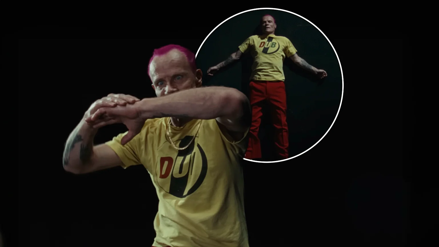 Red Hot Chili Peppers Flea doing an interpretive dance in his music video.