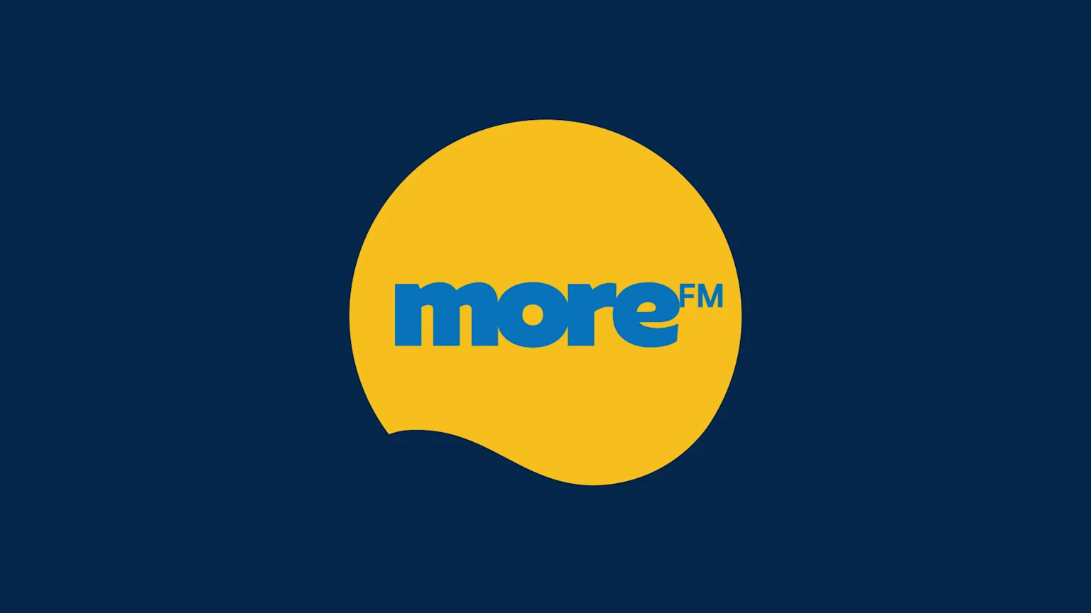 Blue More FM logo on yellow circle blobble, navy blue background