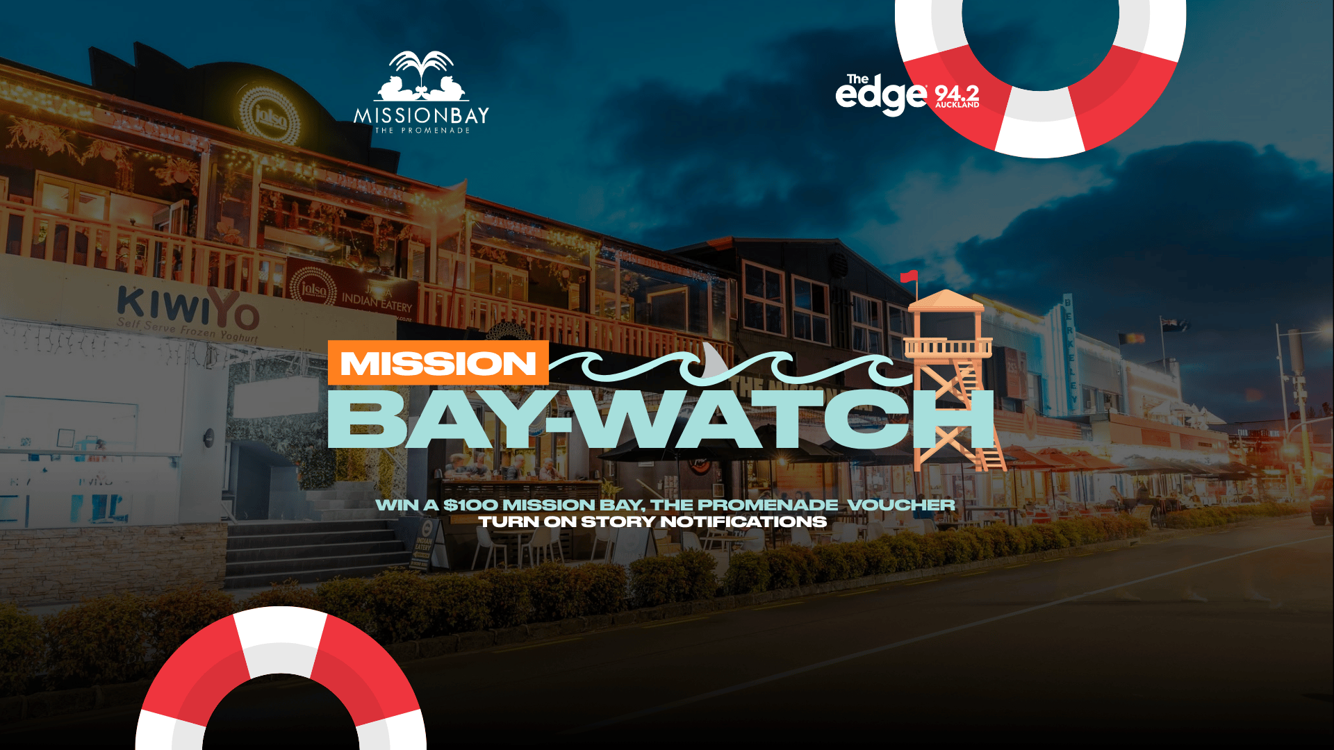 A promotional image for "MISSION BAY-WATCH" shows a lifeguard tower, waves, shark fin, and lifebuoys over a street scene with lit-up buildings at dusk, advertising a $100 Mission Bay voucher and featuring The Edge 94.2 logo.