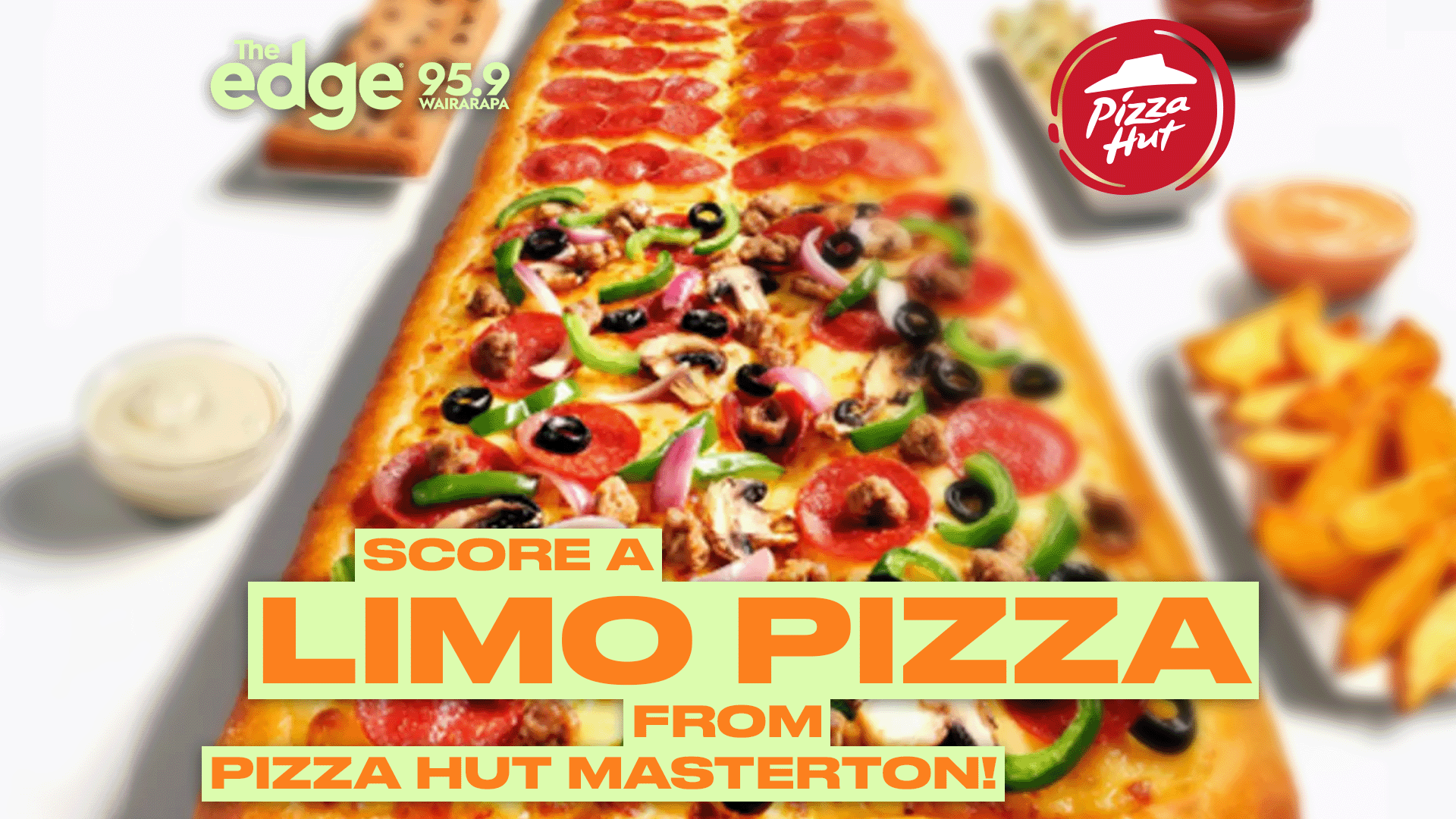 A long rectangular "Limo Pizza" topped with pepperoni, vegetables, and meat, features prominent text "SCORE A LIMO PIZZA FROM PIZZA HUT MASTERTON!" along with "The edge" and "Pizza Hut" logos.