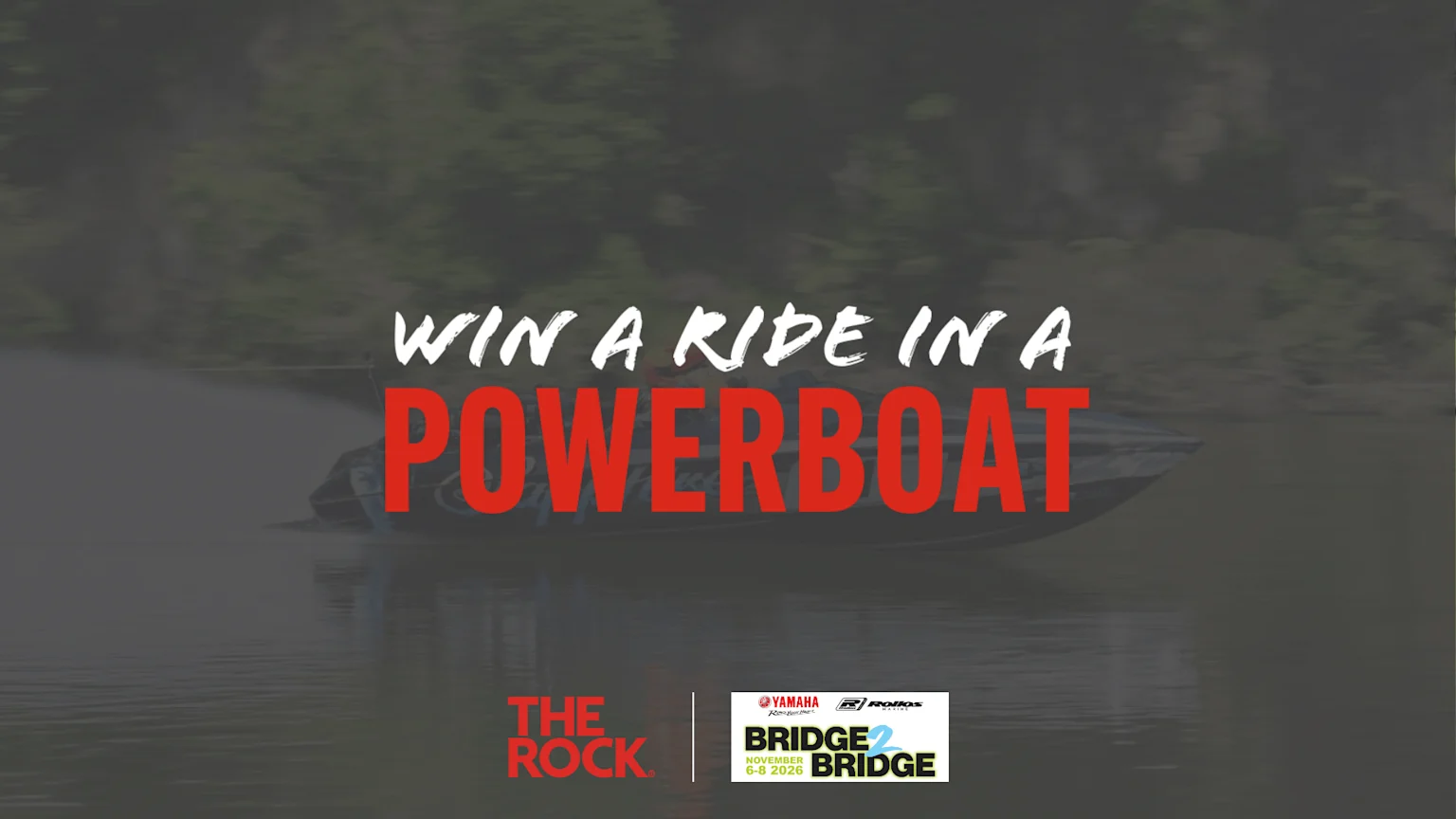 A powerboat speeds across dark water with an overlay of white and red text stating "WIN A RIDE IN A POWERBOAT," along with "THE ROCK" and "YAMAHA BRIDGE 2 BRIDGE" event logos.