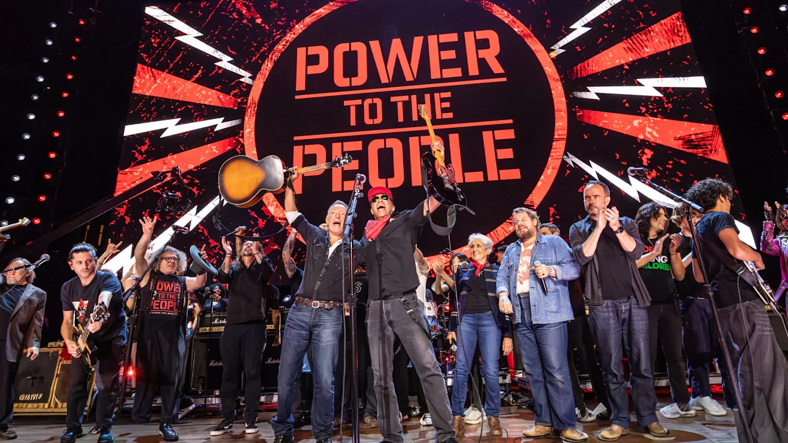 Musicians on stage at Power to the People concert