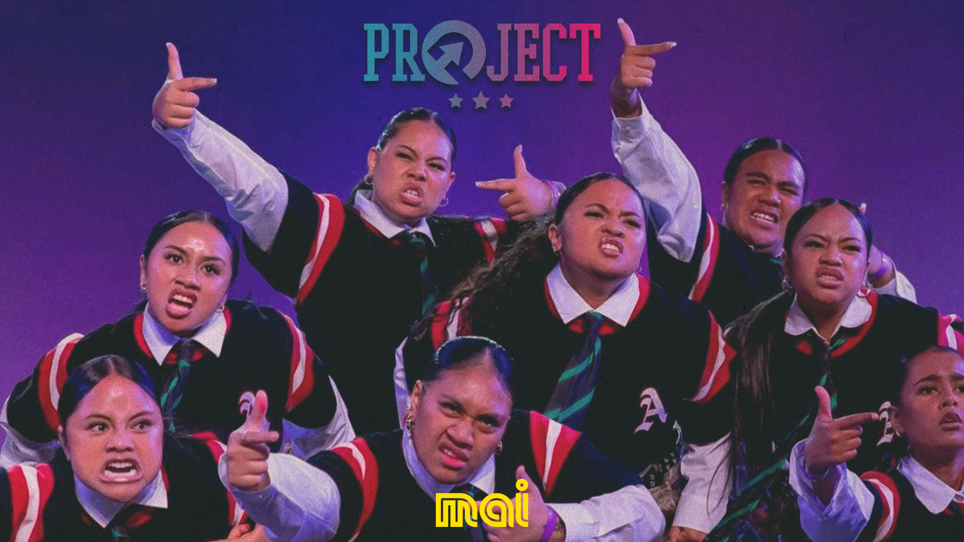 A group of young women in matching uniform-like outfits with ties strike fierce poses with intense facial expressions and pointing hand gestures, under "PROJECT" and "MAI" text.
