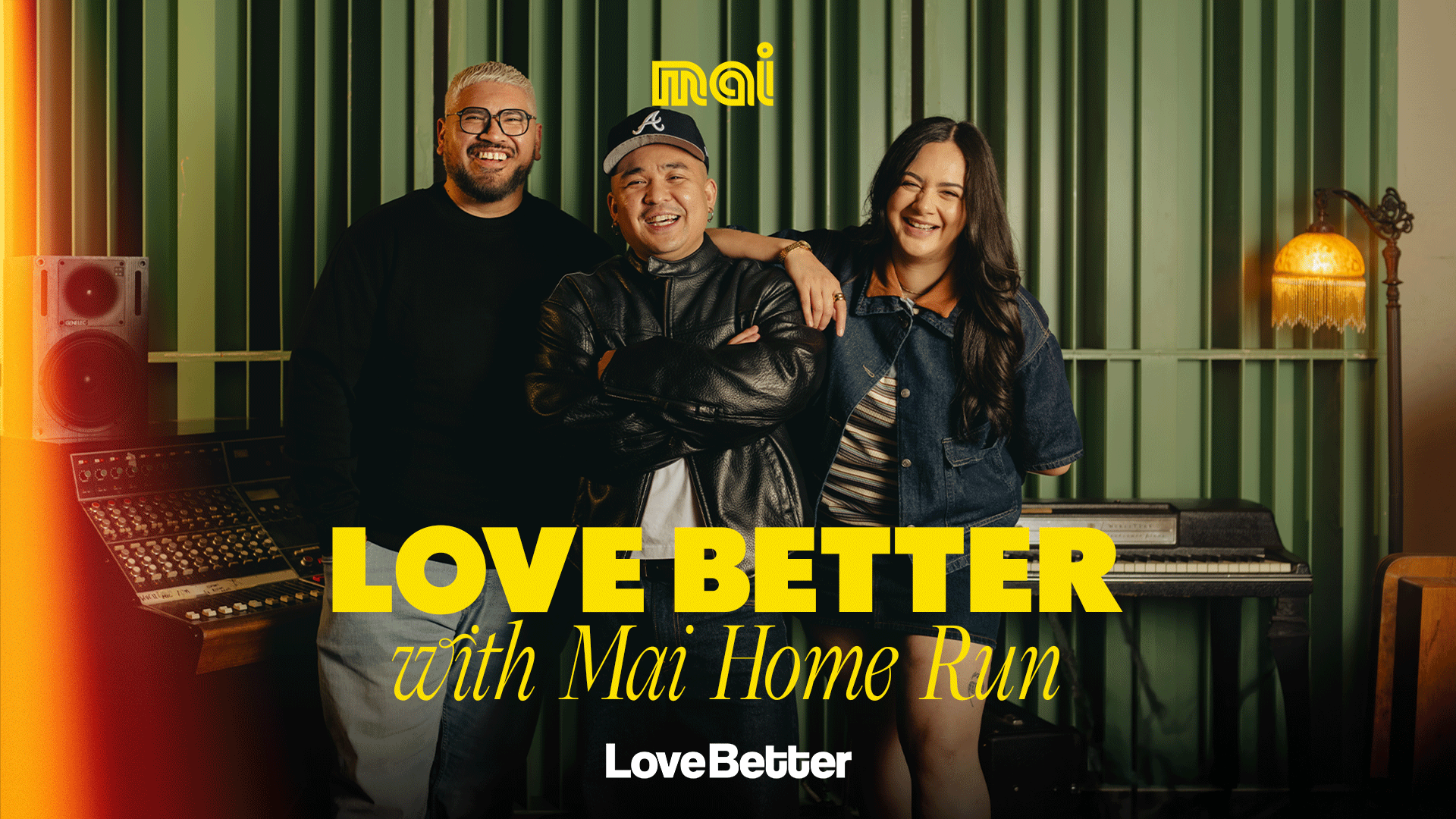 Three smiling hosts, two men and one woman, stand in a recording studio with music equipment, featuring "LOVE BETTER with Mai Home Run" text.