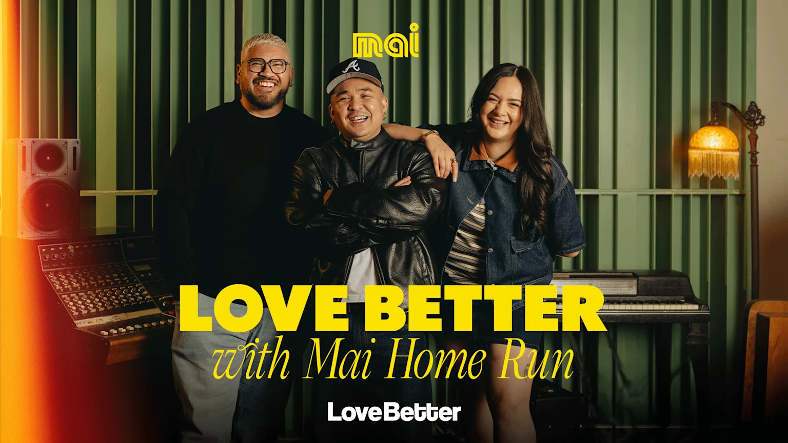 Three smiling hosts, two men and one woman, stand in a recording studio with music equipment, featuring "LOVE BETTER with Mai Home Run" text.