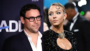 Two celebrities, Scooter Braun and Sydney Sweeney, at a formal event