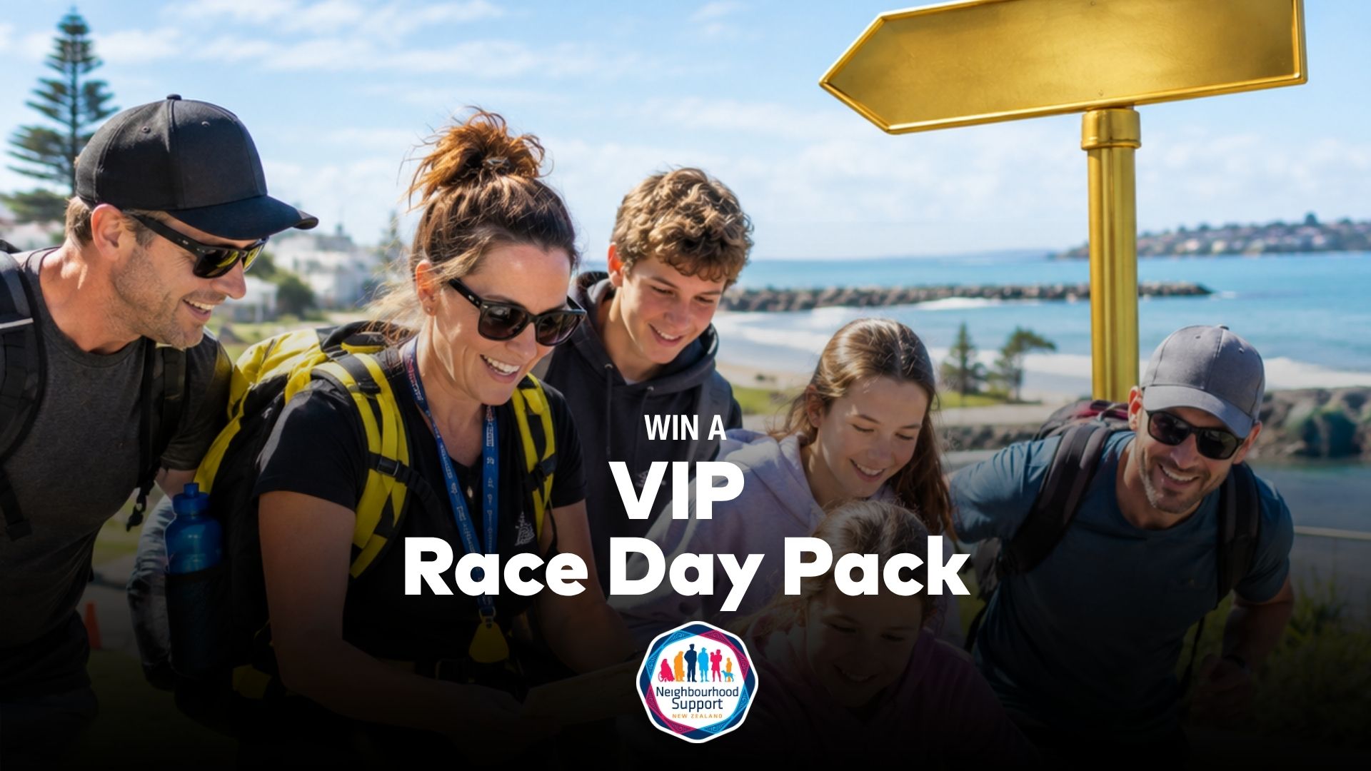 A smiling diverse group of people (adults, teenagers, child) with backpacks, looking engaged, with a beach and a golden signpost in the background, promoting a VIP Race Day Pack and Neighbourhood Support.