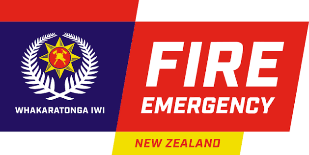 A banner with a blue left side featuring a star and laurel wreath logo above "WHAKARATONGA IWI", and a red right side with "FIRE EMERGENCY" above "NEW ZEALAND" on a yellow stripe.