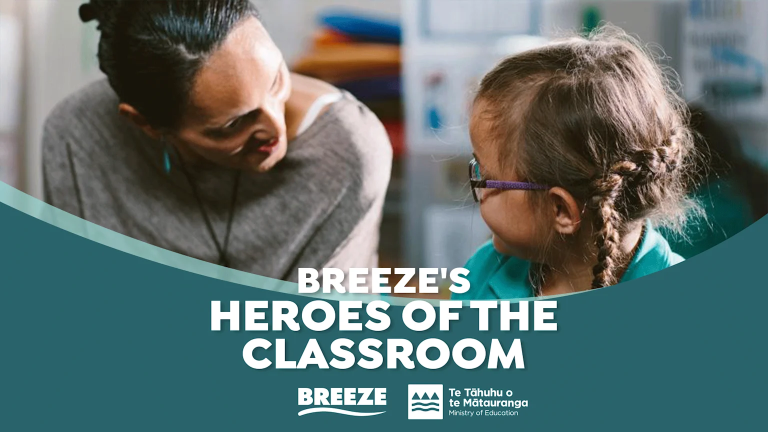 An adult woman looks down at a young girl with braided hair and glasses, with "BREEZE'S HEROES OF THE CLASSROOM" text on a teal overlay.
