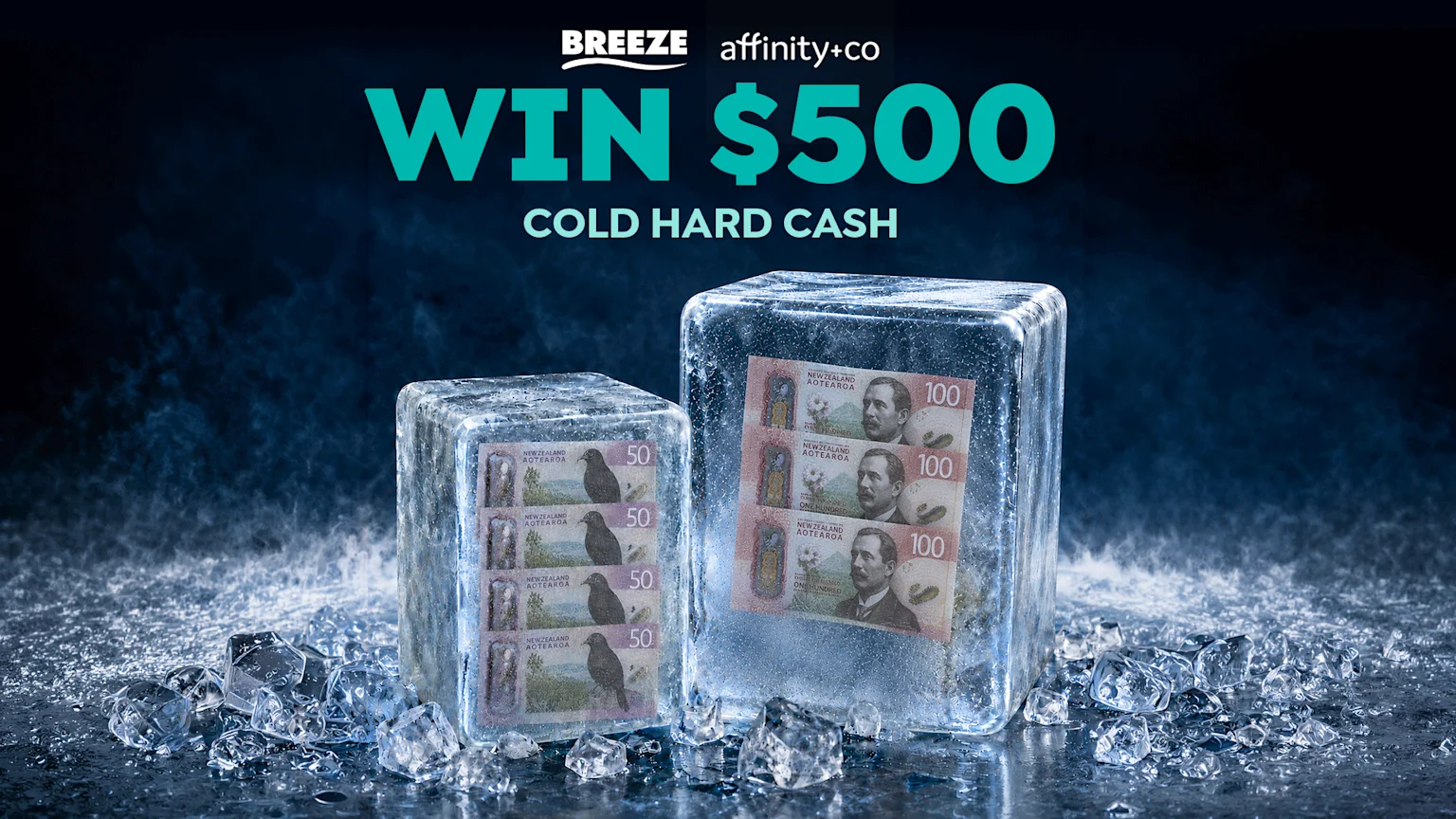 Two ice blocks contain $50 and $100 New Zealand dollar banknotes, surrounded by loose ice cubes and mist, with text above reading "WIN $500 COLD HARD CASH."