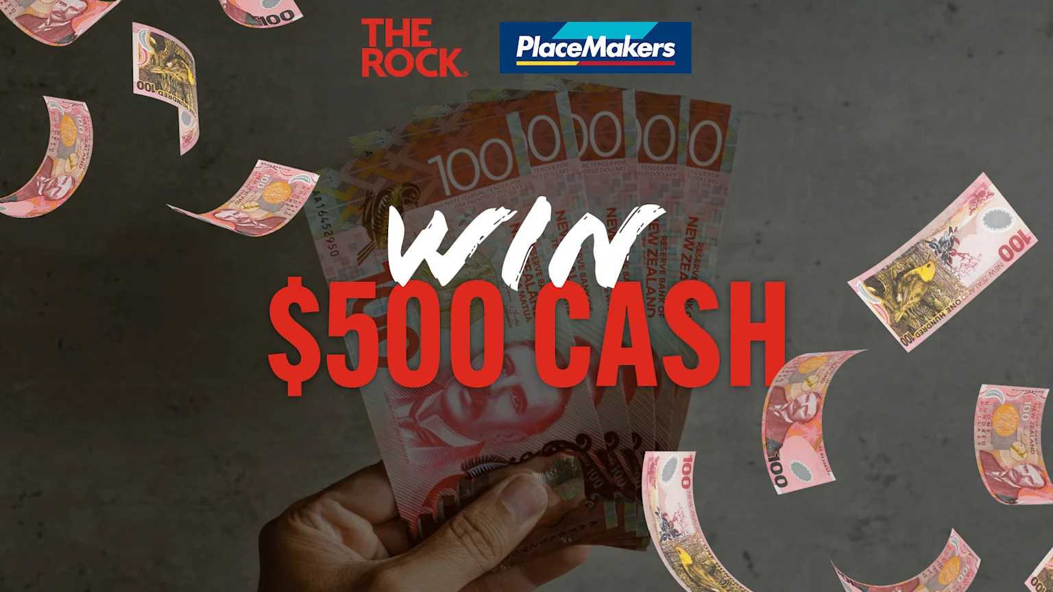 A hand holds a stack of New Zealand 100 dollar bills, with more bills floating around, overlaid with the text "WIN $500 CASH" and logos for The Rock and PlaceMakers.