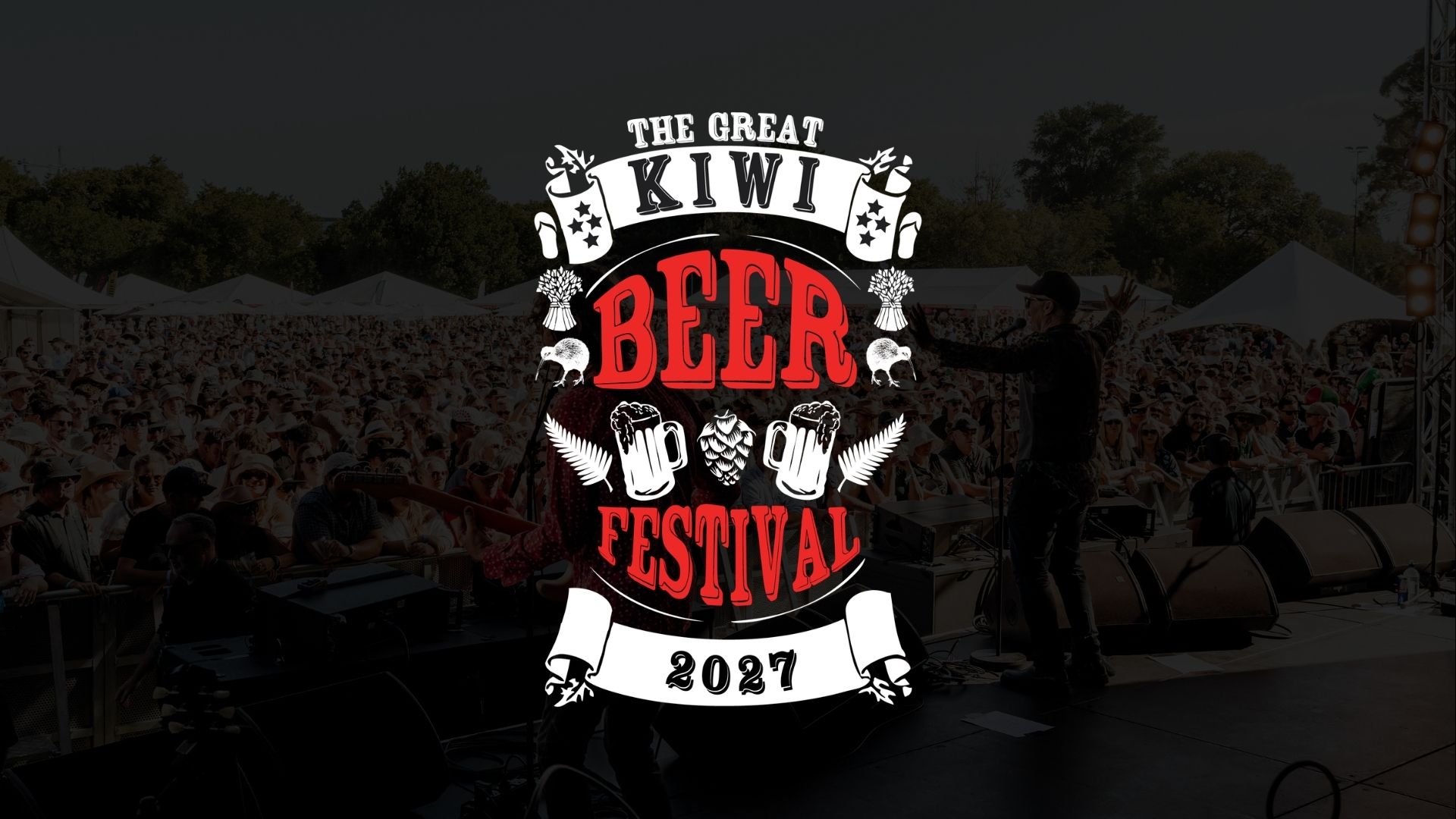 A white and red logo for 'THE GREAT KIWI BEER FESTIVAL 2027' is overlaid on an image of a large outdoor crowd watching a performer on stage.
