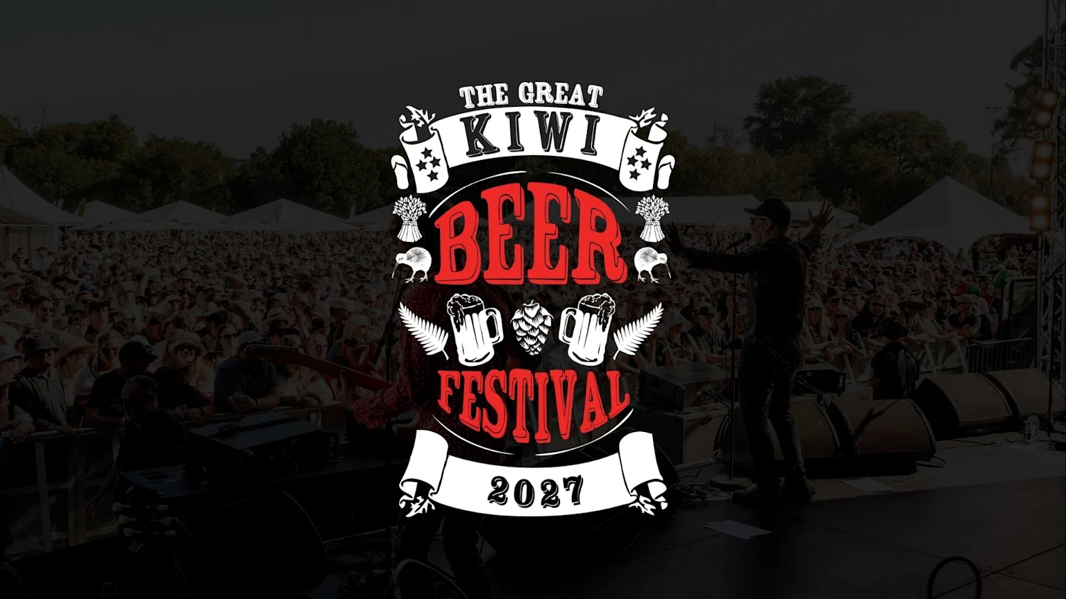 A white and red logo for 'THE GREAT KIWI BEER FESTIVAL 2027' is overlaid on an image of a large outdoor crowd watching a performer on stage.